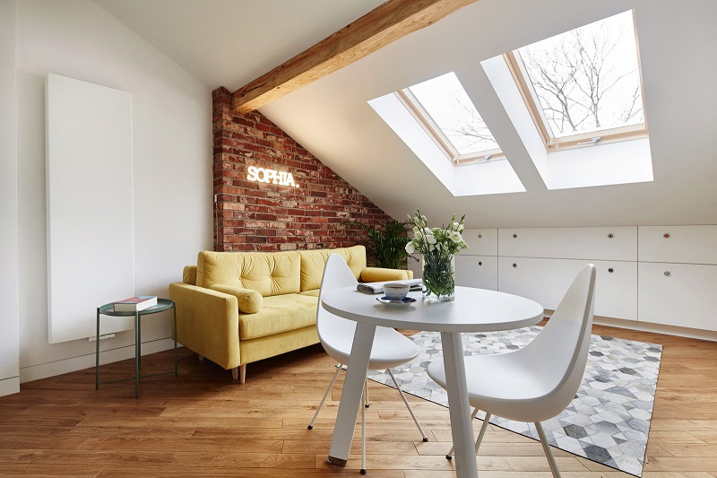 Interior Of The Apartment In The Attic Floor