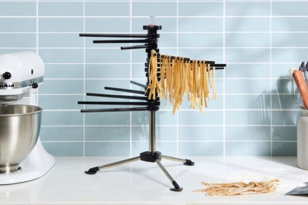 KitchenAid KPDR Pasta Drying Rack on countertop with fresh pasta hanging