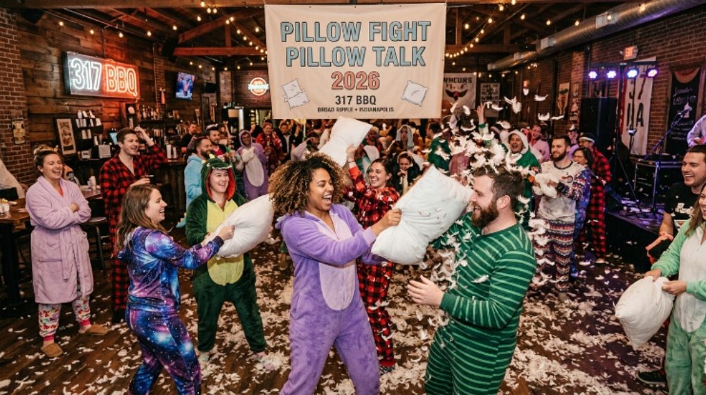 Guests in pajamas enjoying Pillow Fight Pillow Talk 2026 event at 317 BBQ Broad Ripple Indianapolis